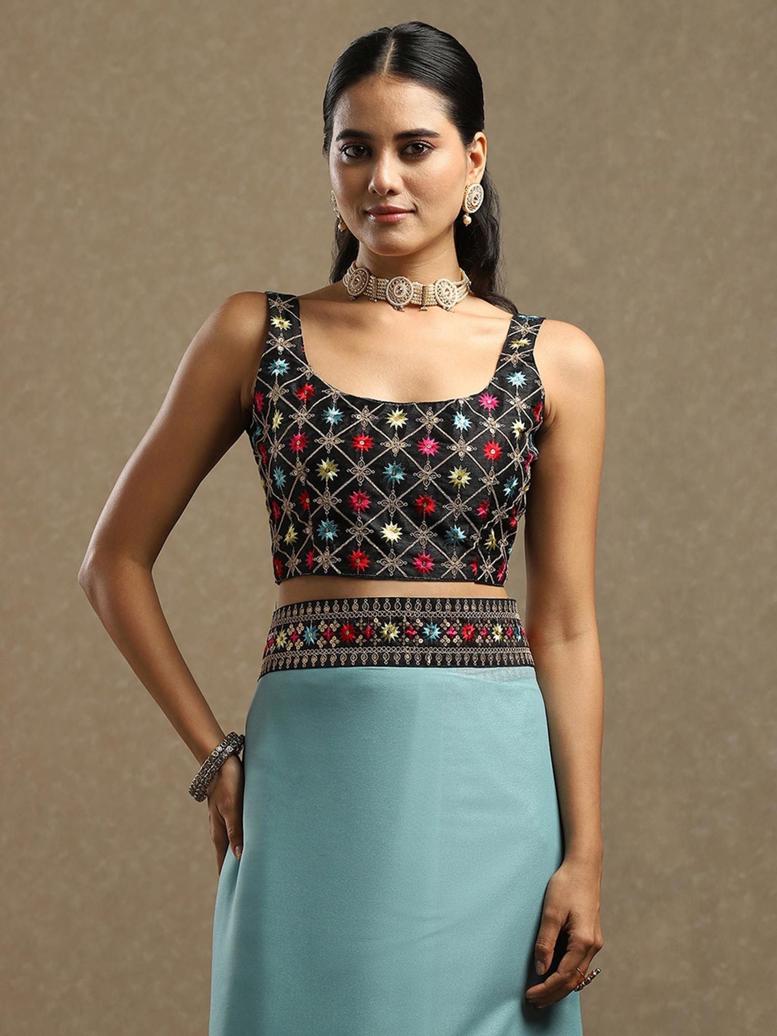 Aqua Blue Georgette Saree with Embroidered Sequined Border